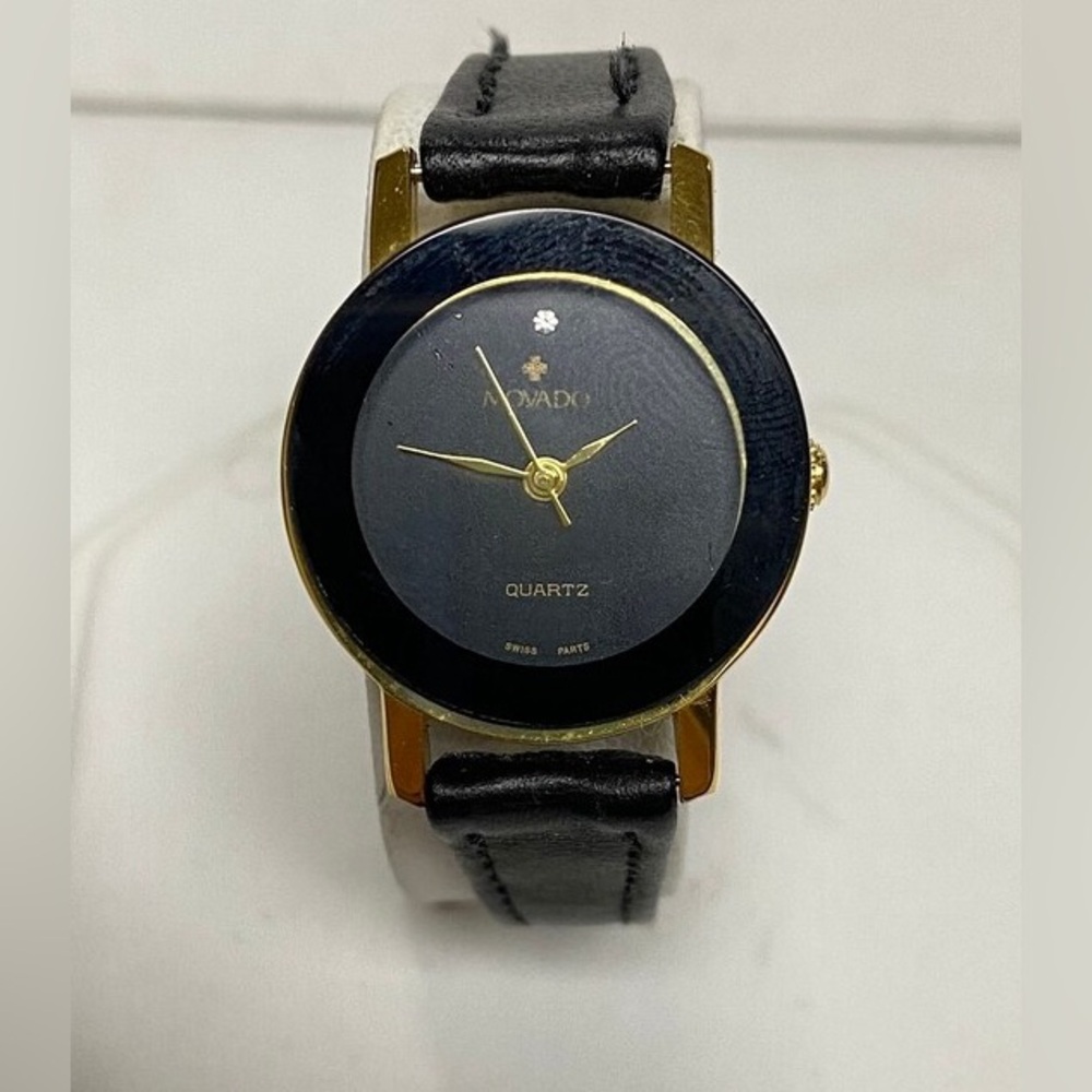 Movado Gold Tone Ladies Quartz Wrist Watch Black Leather Band